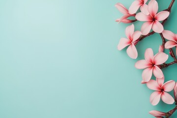 Naklejka premium Nature's beauty is showcased through delicate pink flowers that bloom against a soft green background