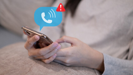 Scam spam call number mobile phone screen security communication fraud technology concept