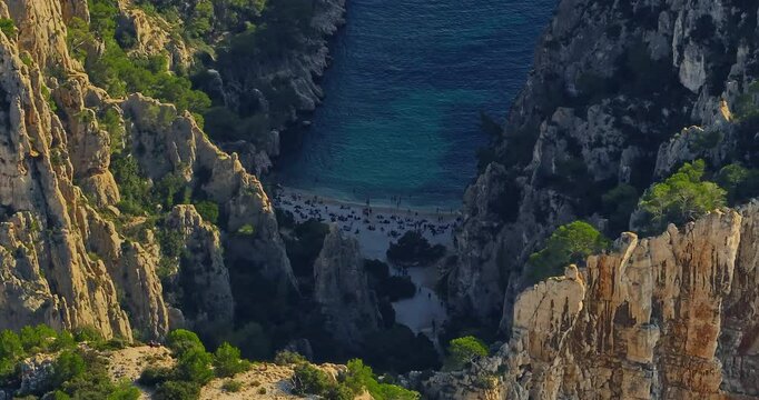 Aerial View of Calanque dEn-Vau near cassis town provence France. Breathtaking view of bay, a beautiful blue lagoon with a white sand beach, surrounded by cliffs, pines, near Marseille in France