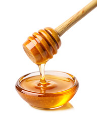 honey dripping with dipper isolated on white background PNG. AI GENERATIVE 