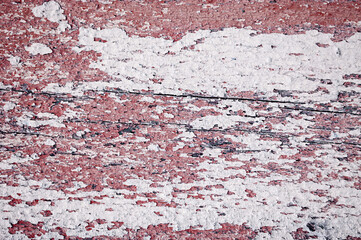 Texture of peeling paint on the old rough wooden surface, peeling paint texture on the wooden background