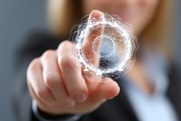 A person&acirc;&euro;&trade;s finger points to a sphere of interconnected connections.