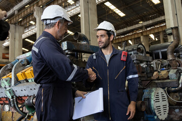 Engineer train engine service team working together at train depot locomotive industry Electric train technician engineer checking controls system for security functions in maintenance infrastructure 