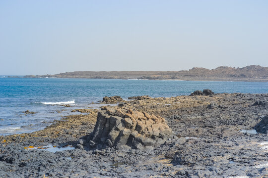 Playa del Bajo de la Burra, the beach with white calcite deposits looking somewhat like popcorn