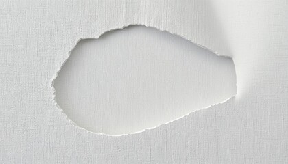 Tearing through barriers artistic paper tear studio setting abstract photography minimalist environment close-up viewpoint creative expression