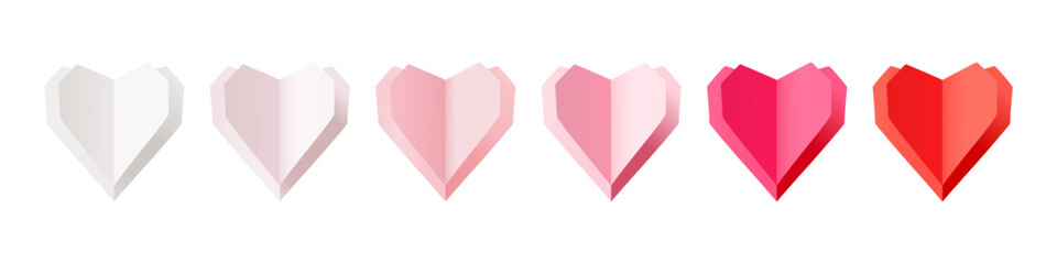 Paper hearts in pink, red and white colors on a white background. Space for text. Love icon symbols for Valentine’s Day, Mother’s Day and Women’s Day.