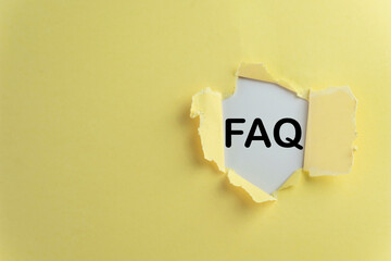 Torn yellow paper with 