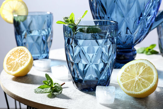 Blue faceted jug and glasses filled with water