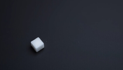 Single White Sugar Cube on Slate
