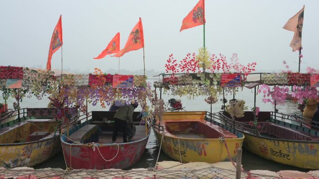 Ayodhya , India-4 January 2025 A lot of boats have been parked on the banks of Saryu river for tourists at Ayodhya Uttar Pradesh India