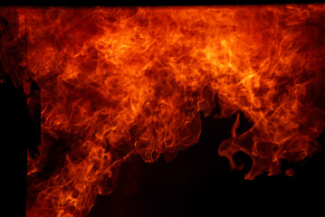 Obraz premium Fire explosion flammable car fire on street smoke, hot danger flame burning effect. Fire burn car accident disaster conflagration. Arson disaster burning fire flame high heat almost explode.