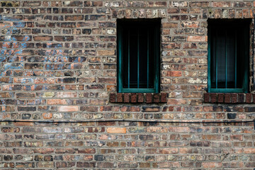 alley window in a brick wall