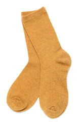 Pair of dark yellow socks isolated on white, top view