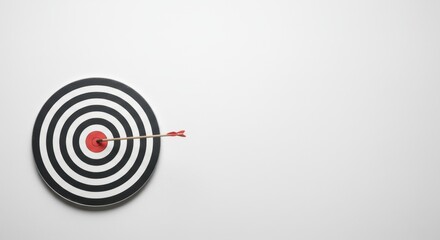 Bullseye achievement: dart perfectly hits target on minimalist white background