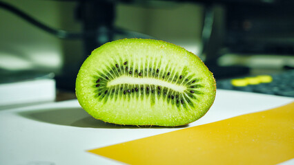 Green kiwi fruit in basket on wooden background, Tropical fruit