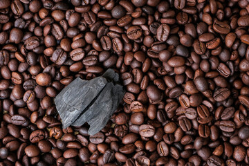 Coffee beans and charcoal, natural production concept