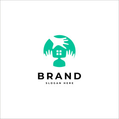 Obraz premium family home care logo with house and hand symbol in flat vector design style