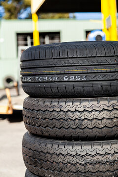 Stack of new and used car tyres