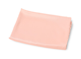 Pink silky bed linens on white background