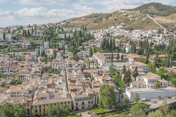 Fototapeta premium Granada, Spain cityscape with white buildings and green trees