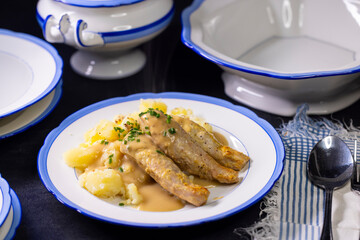 rabbit with cream sauce and mashed potatoes