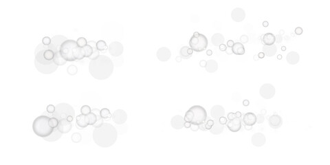 A delicate white bokeh effect featuring glowing orbs and soft sparkles, perfect for design projects.