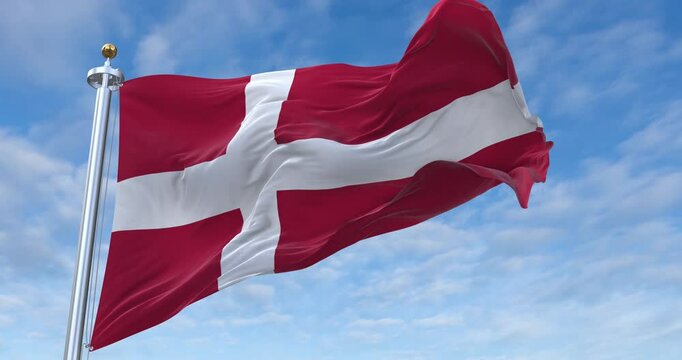 Denmark flag with flagpole waving in wind, rolling clouds background looping, 4K video (Perfect Loop)