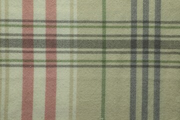 Color woolen fabric with geometrical pattern as background, top view