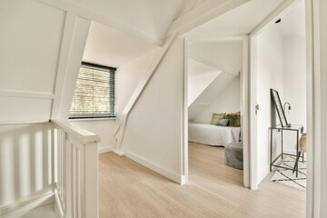 A stylishly designed modern interior featuring clean lines, natural light streaming through...