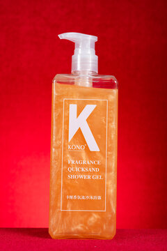 ZHONGSHAN GUANGDONG China-December 28,2024:bottle of Kono fragrance quicksand shower gel on red background vertical composition.