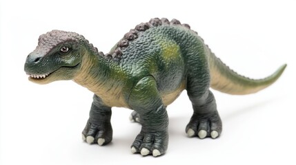 Obraz premium A realistic toy dinosaur isolated on white, front view, well-lit 