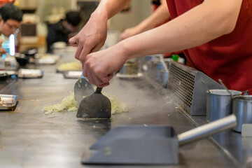 Cabbage teppanyaki is a comforting and flavorful dish that highlights the natural sweetness and crunch of fresh cabbage. Cooked on a sizzling iron plate, the leaves are charred just enough to release