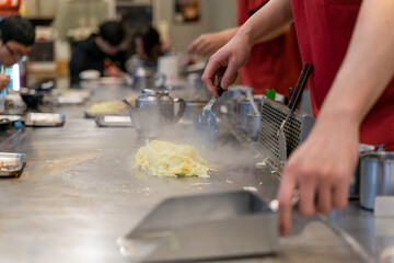 Cabbage teppanyaki is a comforting and flavorful dish that highlights the natural sweetness and crunch of fresh cabbage. Cooked on a sizzling iron plate, the leaves are charred just enough to release
