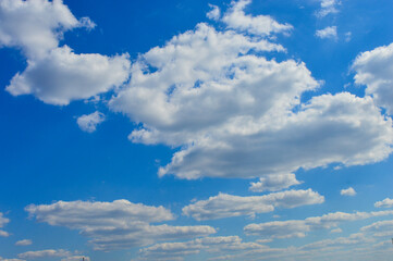 blue sky filled with soft fluffy cumulus clouds sunny day white peaceful backgrounds designs nature...