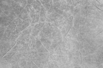 Crumpled creased wrinkled wet paper or fabric texture macro