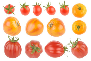 Fresh red and yellow tomatoes from different angles isolated on white