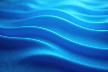 Obraz premium Wavy blue abstract background with gentle ripples, oceanic feel, calming scene, soothing atmosphere