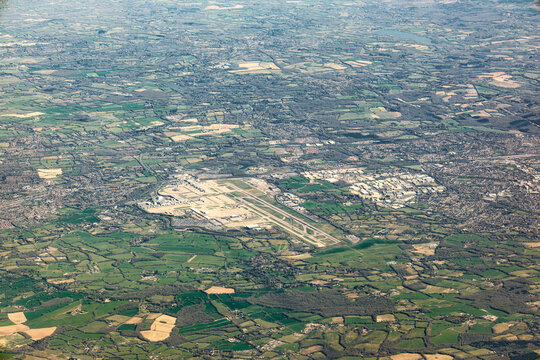 Aerial view of Gatwick Airport and the surrounding towns, villages and countryside of West Sussex in England