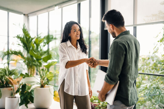 Modern, inclusive, and collaborative atmosphere in the office. They warmly welcome the new colleague