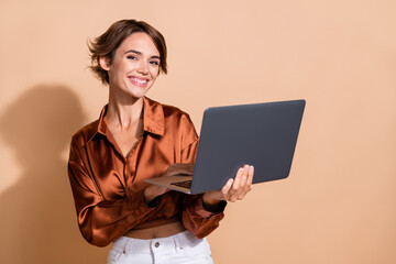 Photo of adorable pretty girl wear brown blouse chatting instagram twitter telegram facebook empty...