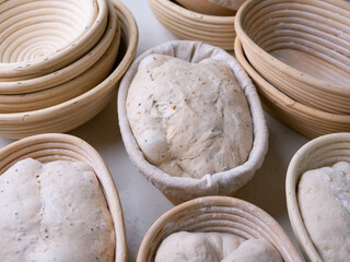 Sourdough Bread in Proofing basket, bannetons baskets for retarding raw dough before baking.