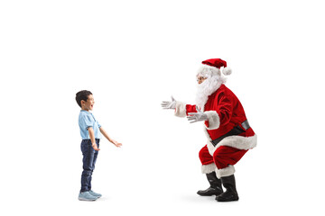 Happy asian boy meeting Santa Claus