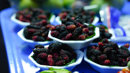 Close-up of native fruits at a tourist attraction in Thailand, Chiang Khan Walking Street.