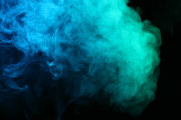 Beautiful smoke in neon lights on dark background