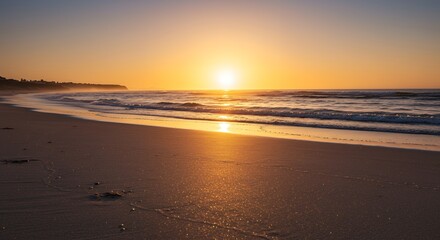Sunrise Over Calm Ocean Waters Reflecting on Sandy Beach
