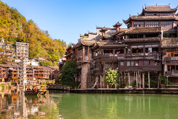 Fenghuang ancient town, China. Traditional chinese wooden houses in old watertown