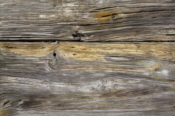 Naklejka premium Aged Wooden Planks with Weathered Texture and Natural Knots, Rustic Wall Background.