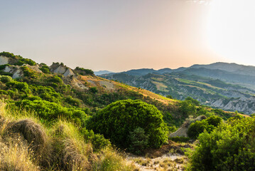 rural countryside landscape inside the badlands national Park during a sunny summer day, Val...