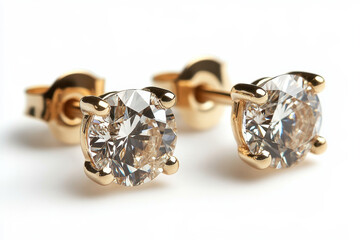 Pair of dazzling gold and diamond earrings on a velvet jewelry display.