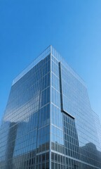 Obraz premium a building with many windows and blue sky in background.